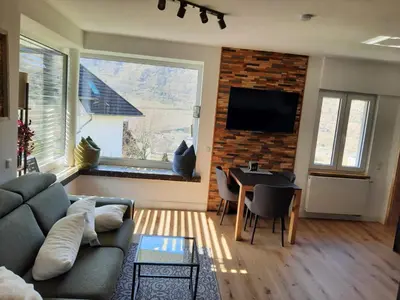 Ein Sitzbereich in der Unterkunft Ferienwohnung Sonnenseite