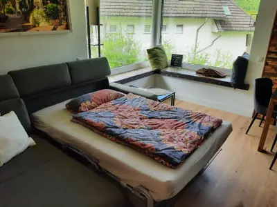 Ein Sitzbereich in der Unterkunft Ferienwohnung Sonnenseite