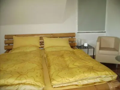 Ein Bett oder Betten in einem Zimmer der Unterkunft Ambiente