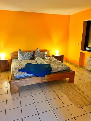 Ein Bett oder Betten in einem Zimmer der Unterkunft Zeitwohnung Kenn bei Trier