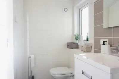 Ein Badezimmer in der Unterkunft Ferienhaus Ufergeheimnis am Gülser Moselbogen I 2 SZ I 5 Gäste I Badebucht I Grill I Garten