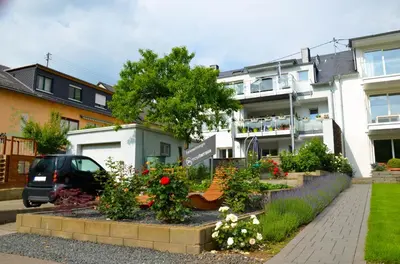 Ein Garten an der Unterkunft Ferienwohnungen Moselterrasse