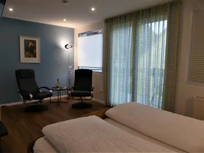 Ein Bett oder Betten in einem Zimmer der Unterkunft Ferienweingut Rudorfer