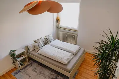 Ein Bett oder Betten in einem Zimmer der Unterkunft Gemütliche Rheinblick Residenz