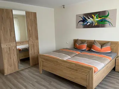 Ein Bett oder Betten in einem Zimmer der Unterkunft Ferienwohnung Korneli