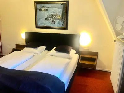 Ein Bett oder Betten in einem Zimmer der Unterkunft Villa Cornely