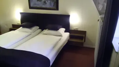 Ein Bett oder Betten in einem Zimmer der Unterkunft Villa Cornely