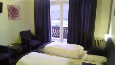 Ein Bett oder Betten in einem Zimmer der Unterkunft Villa Cornely