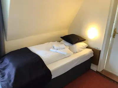 Ein Bett oder Betten in einem Zimmer der Unterkunft Villa Cornely