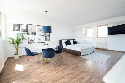 TV/Unterhaltungsangebot in der Unterkunft Penthouse Panoramablick Whirlpool Parken