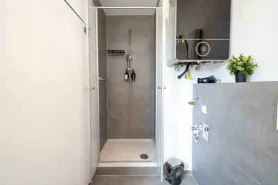 Ein Badezimmer in der Unterkunft Penthouse Panoramablick Whirlpool Parken