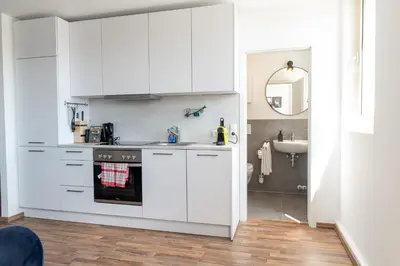 Küche/Küchenzeile in der Unterkunft Penthouse Panoramablick Whirlpool Parken