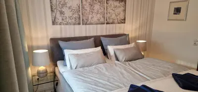 Ein Bett oder Betten in einem Zimmer der Unterkunft Ferienwohnung Brohltal-Aue