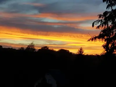 Blick auf den Sonnenuntergang/Sonnenaufgang von der Ferienwohnung aus oder aus der Nähe
