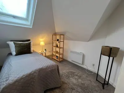 Ein Bett oder Betten in einem Zimmer der Unterkunft Urban Charm Design Loft