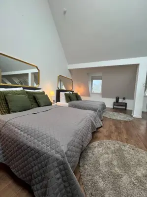 Ein Bett oder Betten in einem Zimmer der Unterkunft Urban Charm Design Loft