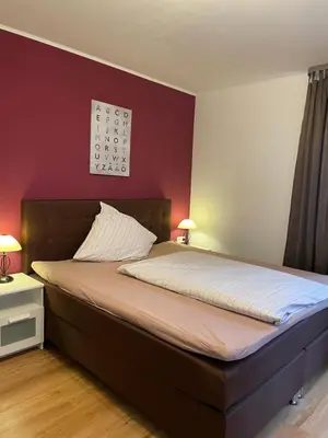 Ein Bett oder Betten in einem Zimmer der Unterkunft Cochemer Arkaden