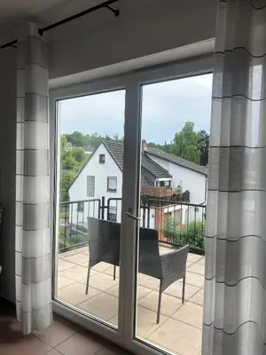Ein Balkon oder eine Terrasse in der Unterkunft Rheinview Sunset Apartment Urbar