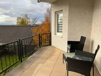 Ein Balkon oder eine Terrasse in der Unterkunft Rheinview Sunset Apartment Urbar