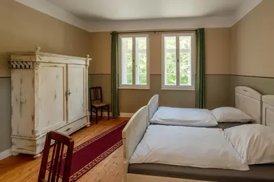 Ein Bett oder Betten in einem Zimmer der Unterkunft Museumsbahnhof Ahütte