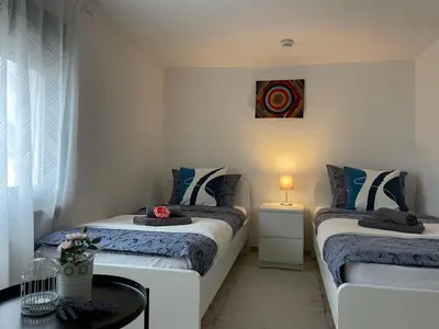 Ein Bett oder Betten in einem Zimmer der Unterkunft Ferienhaus Lenartz