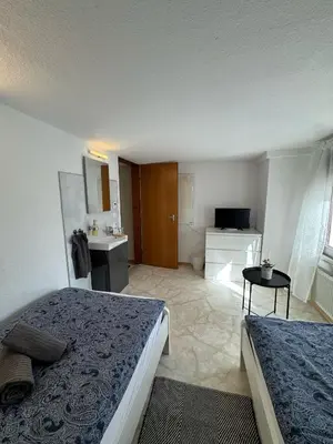 Ein Bett oder Betten in einem Zimmer der Unterkunft Ferienhaus Lenartz