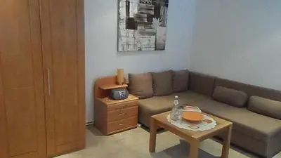 Ein Sitzbereich in der Unterkunft Bichlhof Bärfra Ferienwohnung Am Brunnen