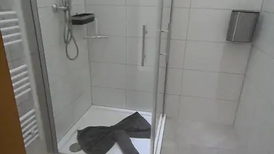 Ein Badezimmer in der Unterkunft Bichlhof Bärfra Ferienwohnung Am Brunnen