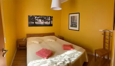 Ein Bett oder Betten in einem Zimmer der Unterkunft Traumhaus am Maar 1