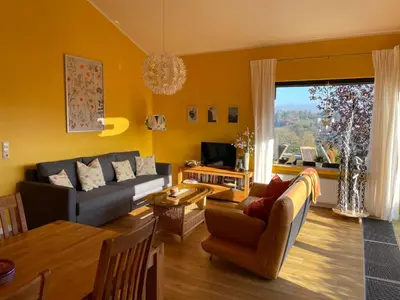 Ein Sitzbereich in der Unterkunft Traumhaus am Maar 1