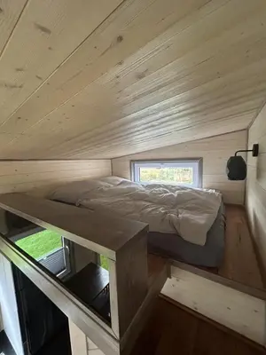 Ein Bett oder Betten in einem Zimmer der Unterkunft Tiny House