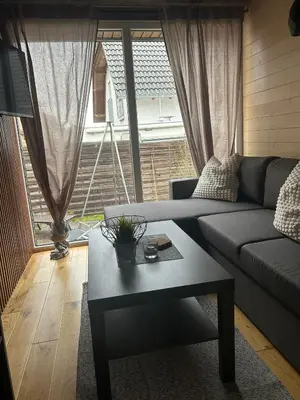 Ein Sitzbereich in der Unterkunft Tiny House