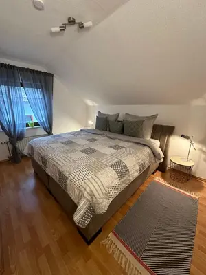 Ein Bett oder Betten in einem Zimmer der Unterkunft Ferienwohnung Forest