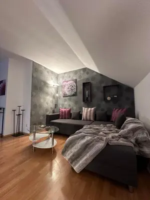 Ein Sitzbereich in der Unterkunft Ferienwohnung Forest