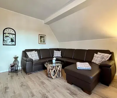 Ein Sitzbereich in der Unterkunft Haus Meerten