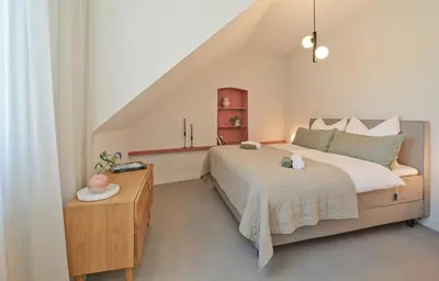 Ein Bett oder Betten in einem Zimmer der Unterkunft Style pur - Designer-Wohnung in Top-Lage im Zentrum! - Bis zu 3 Personen - Waschmaschine - gratis WLAN - Marvin Jeske Retreats