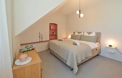 Ein Bett oder Betten in einem Zimmer der Unterkunft Style pur - Designer-Wohnung in Top-Lage im Zentrum! - Bis zu 3 Personen - Waschmaschine - gratis WLAN - Marvin Jeske Retreats
