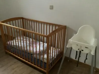 Ein Bett oder Betten in einem Zimmer der Unterkunft Mosel Ferienresidenz ZickZack