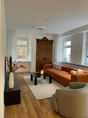 Ein Sitzbereich in der Unterkunft BG Living & Hosting - Stilvolle Mosel-Ferienwohnung 