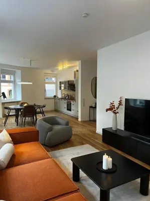Ein Sitzbereich in der Unterkunft BG Living & Hosting - Stilvolle Mosel-Ferienwohnung 