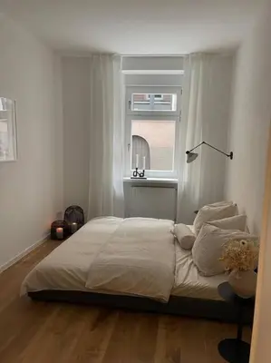 Ein Bett oder Betten in einem Zimmer der Unterkunft BG Living & Hosting - Stilvolle Mosel-Ferienwohnung 