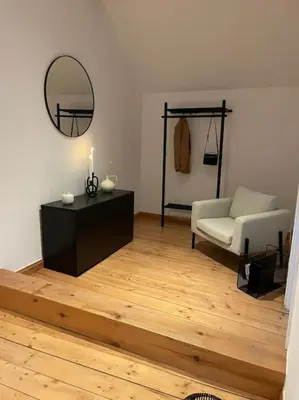 Ein Bett oder Betten in einem Zimmer der Unterkunft Mosel-Charm - Urige Dachgeschosswohnung für 6 Personen - 3 Schlafzimmer, Fahrradkeller & Gratis WLAN - BG Living & Hosting