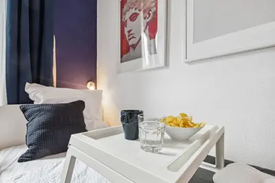 Ein Bett oder Betten in einem Zimmer der Unterkunft Charmante & gemütliche Wohnung