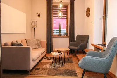 Ein Sitzbereich in der Unterkunft Rustikal trifft Modern, Bar Keller, Terrasse, 2 Schlafzimmer