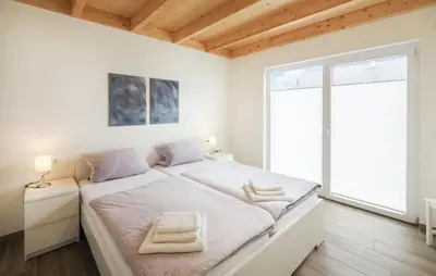 Ein Bett oder Betten in einem Zimmer der Unterkunft Ferienpark Wolfsschlucht