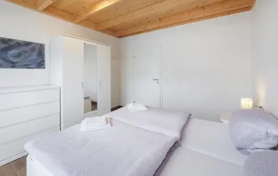 Ein Bett oder Betten in einem Zimmer der Unterkunft Ferienpark Wolfsschlucht