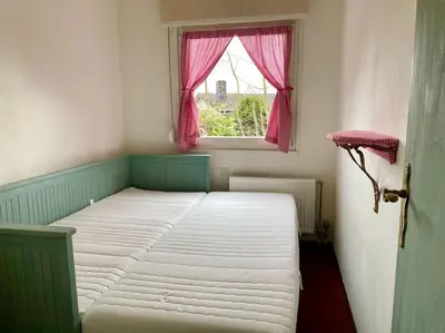 Ein Bett oder Betten in einem Zimmer der Unterkunft Haus am See mit fantastischem Blick