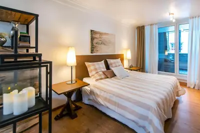 Ein Bett oder Betten in einem Zimmer der Unterkunft Ferienwohnung Koblenz Altstadt