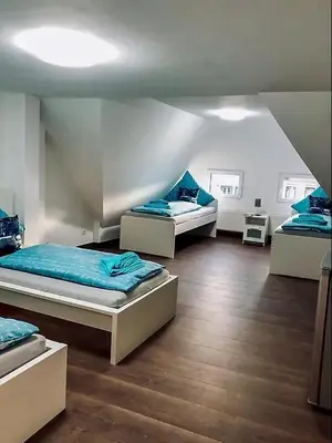 Ein Bett oder Betten in einem Zimmer der Unterkunft Ring Home Stay