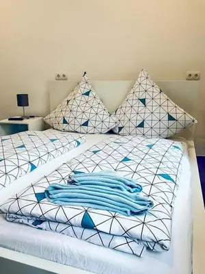 Ein Bett oder Betten in einem Zimmer der Unterkunft Ring Home Stay